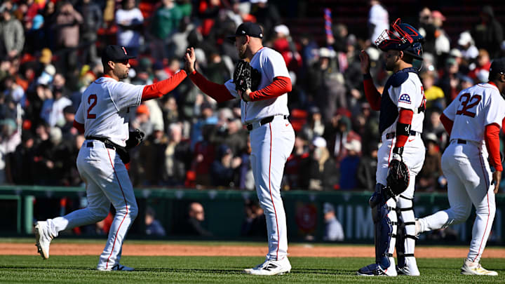 Apr 8, 2026; Boston, Massachusetts, USA; Boston Red Sox relief pitcher Ryan Watson (56) celebrates beating the Milwaukee Brewers with second baseman Isiah Kiner-Falefa (2) at Fenway Park. Mandatory Credit: Eric Canha-Imagn Images Apr 8, 2026; Boston, Massachusetts, USA; Boston Red Sox relief pitcher Ryan Watson (56) celebrates beating the Milwaukee Brewers with second baseman Isiah Kiner-Falefa (2) at Fenway Park. Mandatory Credit: Eric Canha-Imagn Images