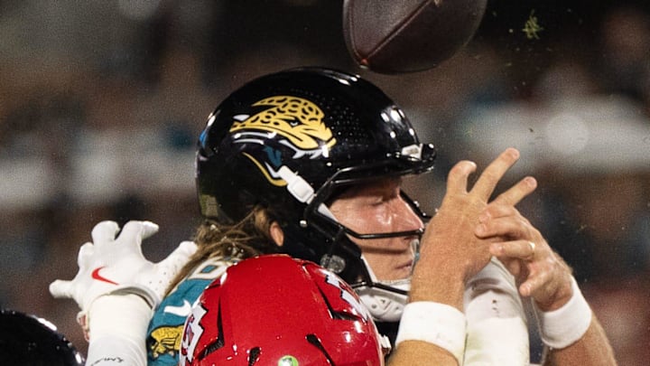 Jacksonville Jaguars quarterback Trevor Lawrence (16) attempts a touchdown in the second quarter but fumbles during a Monday Night NFL football game at EverBank Stadium, Monday, Oct. 6, 2025, in Jacksonville, Fla.