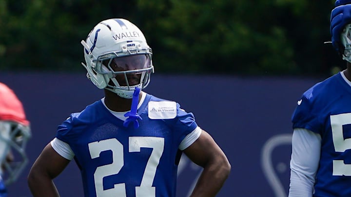 Indianapolis Colts cornerback Justin Walley (27), Indianapolis Colts Jacob Phillips, and Indianapolis Colts defensive end Desmond Little (78) watches from the field Tuesday, June 10, 2025, during NFL Colts mandatory mini camp at the Indiana Farm Bureau Football Center in Indianapolis.