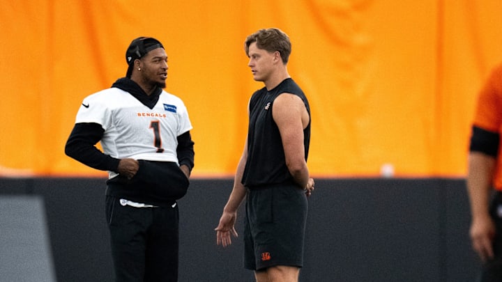 Ja'Marr Chase and Joe Burrow talk during mandatory minicamp Ja'Marr Chase and Joe Burrow talk during mandatory minicamp