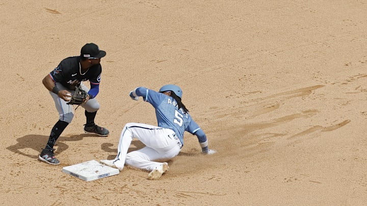 Jun 14, 2025; Washington, District of Columbia, USA; Miami Marlins second base Otto Lopez (6) attempts to turn a double play at second base ahead of a slide by Washington Nationals shortstop CJ Abrams (5) during the eighth inning at Nationals Park. 