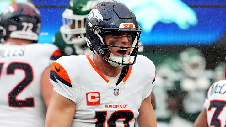 Sep 29, 2024; East Rutherford, New Jersey, USA;  Denver Broncos quarterback Bo Nix (10) celebrates the win over against the New York Jets at MetLife Stadium. 