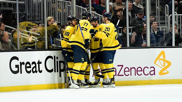 Feb 17, 2025; Boston, MA, USA; [Imagn Images direct customers only]  Team Sweden forward Jesper Bratt (63) is congratulated by his teammates after scoring a goal during the first period in a 4 Nations Face-Off ice hockey game against Team USA at TD Garden. Mandatory Credit: Bob DeChiara-Imagn Images
