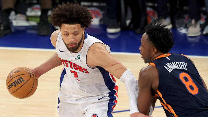 Apr 21, 2025; New York, New York, USA; Detroit Pistons guard Cade Cunningham (2) controls the ball against New York Knicks forward OG Anunoby (8) during the fourth quarter of game two of the first round of the 2024 NBA Playoffs at Madison Square Garden. Mandatory Credit: Brad Penner-Imagn Images