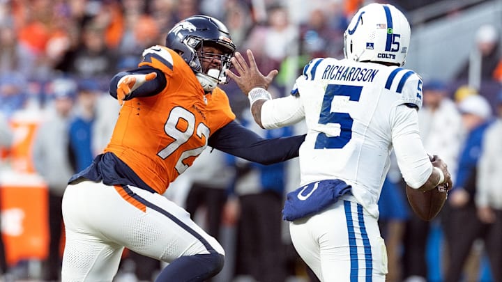 December 15, 2024, Denver, Colorado, USA: Broncos OLB DONDREA TILLMAN gives chase to Colts QB ANTHONY RICHARDSON during the 2nd. Half at Empower Field at Mile High Sunday afternoon.The Broncos beat the Colts 31-13. December 15, 2024, Denver, Colorado, USA: Broncos OLB DONDREA TILLMAN gives chase to Colts QB ANTHONY RICHARDSON during the 2nd. Half at Empower Field at Mile High Sunday afternoon.The Broncos beat the Colts 31-13.