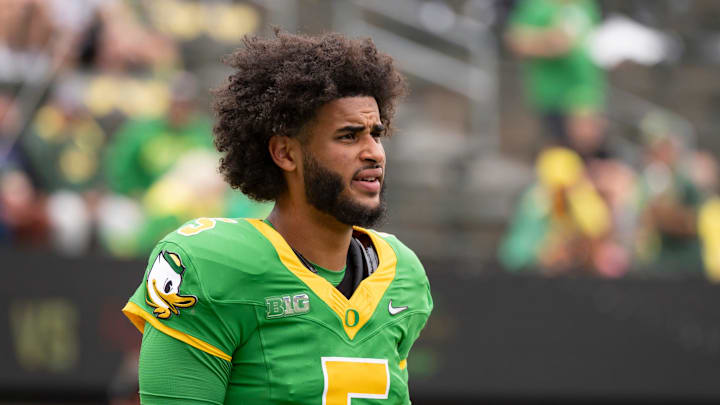 Oregon quarterback Dante Moore warms up as the Oregon Ducks host the Oklahoma State Cowboys on Sept. 6, 2025, at Autzen Stadium in Eugene, Oregon. Oregon quarterback Dante Moore warms up as the Oregon Ducks host the Oklahoma State Cowboys on Sept. 6, 2025, at Autzen Stadium in Eugene, Oregon.