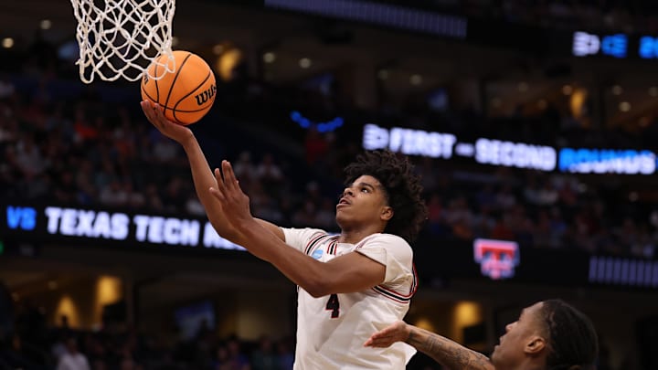 Mar 20, 2026; Tampa, FL, USA; Texas Tech Red Raiders guard Christian Anderson (4) shoots against Akron Zips guard Sharron Young (3) in the first half during a first round game of the men's 2026 NCAA Tournament at Benchmark International Arena. Mandatory Credit: Matt Pendleton-Imagn Images Mar 20, 2026; Tampa, FL, USA; Texas Tech Red Raiders guard Christian Anderson (4) shoots against Akron Zips guard Sharron Young (3) in the first half during a first round game of the men's 2026 NCAA Tournament at Benchmark International Arena. Mandatory Credit: Matt Pendleton-Imagn Images