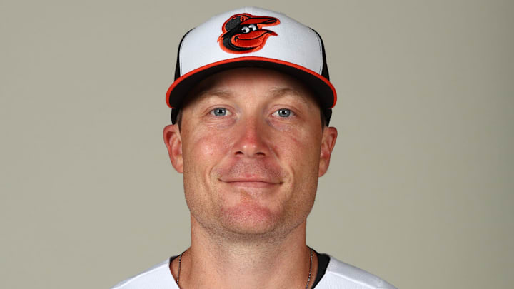 Feb 23, 2023; Sarasota, FL, USA; Baltimore Orioles offensive strategy coach Cody Asche (63) poses for a photo at Ed Smith Stadium