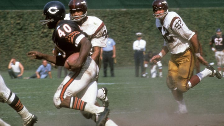 Sep 15, 1968; Chicago, IL, USA: FILE PHOTO; Chicago Bears running back Gayle Sayers (40) runs the ball against the Washington Redskins at Wrigley Field Sep 15, 1968; Chicago, IL, USA: FILE PHOTO; Chicago Bears running back Gayle Sayers (40) runs the ball against the Washington Redskins at Wrigley Field