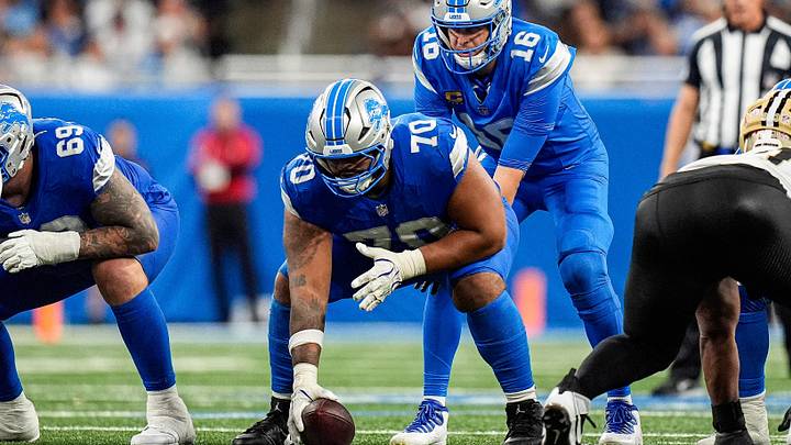 Detroit Lions quarterback Jared Goff (16) calls for a snap against New Orleans Saints from offensive lineman Juice Scruggs (70) during the second half at Ford Field in Detroit on Sunday, Sept. 13, 2026.