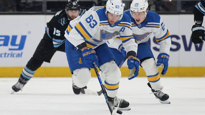 Apr 16, 2026; Salt Lake City, Utah, USA; St. Louis Blues left wing Jake Neighbours (63) brings the puck up the ice against the Utah Mammoth during the second period at Delta Center. Mandatory Credit: Rob Gray-Imagn Images Apr 16, 2026; Salt Lake City, Utah, USA; St. Louis Blues left wing Jake Neighbours (63) brings the puck up the ice against the Utah Mammoth during the second period at Delta Center. Mandatory Credit: Rob Gray-Imagn Images