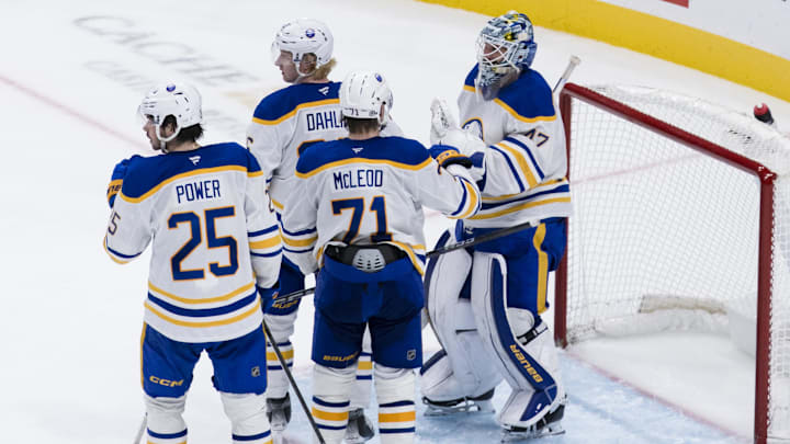 Nov 23, 2024; San Jose, California, USA;  Buffalo Sabres goaltender James Reimer (47) and center Ryan McLeod (71) and other players celebrate their team’s win over the San Jose Sharks at SAP Center in San Jose. Mandatory Credit: John Hefti-Imagn Images