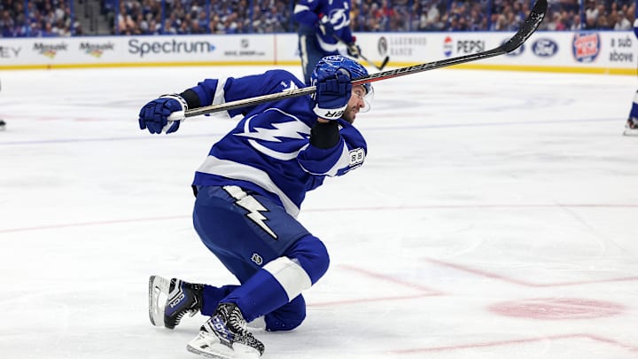 Nikita Kucherov shooting the puck against the Nashville Predators
