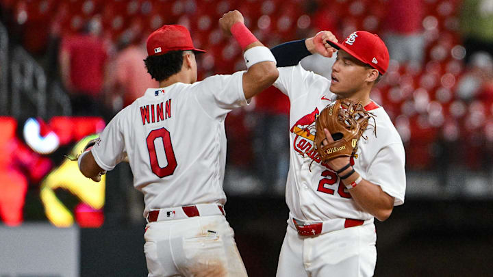 May 4, 2026; St. Louis, Missouri, USA; St. Louis Cardinals shortstop Masyn Winn (0) celebrates with second baseman JJ Wetherholt (26) after the Cardinals defeated the Milwaukee Brewers at Busch Stadium. Mandatory Credit: Jeff Curry-Imagn Images