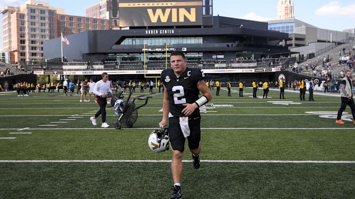 Sep 27, 2025; Nashville, Tennessee, USA;  Vanderbilt Commodores quarterback Diego Pavia (2) runs off the field after the win against the Utah State Aggies after the game at FirstBank Stadium. Mandatory Credit: Steve Roberts-Imagn Images