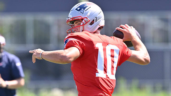 Jul 28, 2025; Foxborough, MA, USA; New England Patriots quarterback Drake Maye (10) throws a pass during training camp at Gillette Stadium. Mandatory Credit: Eric Canha-Imagn Images