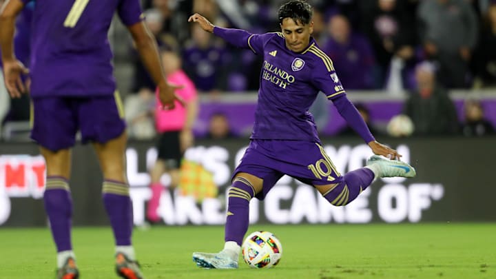Nov 30, 2024; Orlando, Florida, USA; Orlando City midfielder Facundo Torres (10) kicks the ball against the New York Red Bulls during the first half in the 2024 MLS Cup Eastern Conference Final match at Inter&Co Stadium. Mandatory Credit: Morgan Tencza-Imagn Images