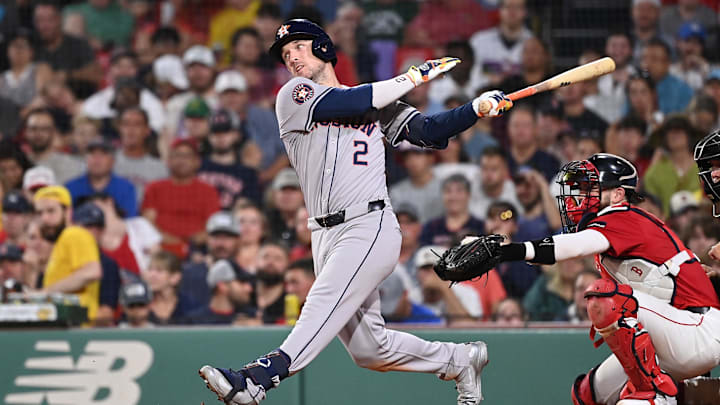 Aug 9, 2024; Boston, Massachusetts, USA; Houston Astros third baseman Alex Bregman (2) hits a single against the Boston Red Sox during the fifth inning at Fenway Park. Mandatory Credit: Eric Canha-Imagn Images