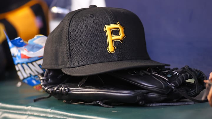 Sep 8, 2023; Atlanta, Georgia, USA; A detailed view of a Pittsburgh Pirates hat and glove before a game against the Pittsburgh Pirates in the first inning at Truist Park. Mandatory Credit: Brett Davis-Imagn Images Sep 8, 2023; Atlanta, Georgia, USA; A detailed view of a Pittsburgh Pirates hat and glove before a game against the Pittsburgh Pirates in the first inning at Truist Park. Mandatory Credit: Brett Davis-Imagn Images