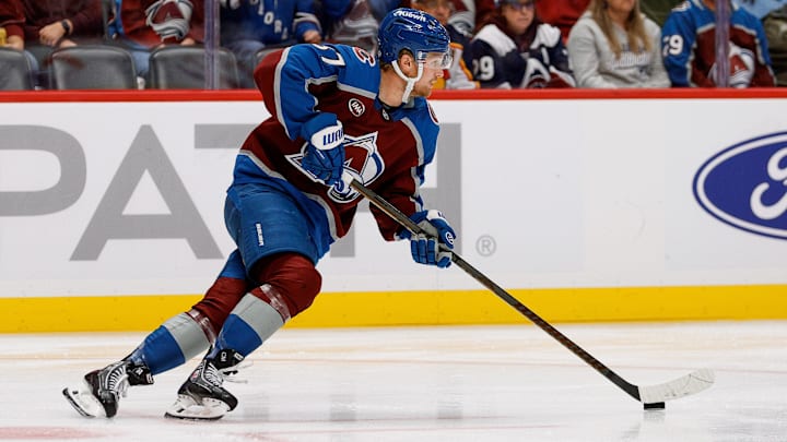 Oct 14, 2024; Denver, Colorado, USA; Colorado Avalanche center Casey Mittelstadt (37) controls the puck in the third period against the New York Islanders at Ball Arena. Mandatory Credit: Isaiah J. Downing-Imagn Images