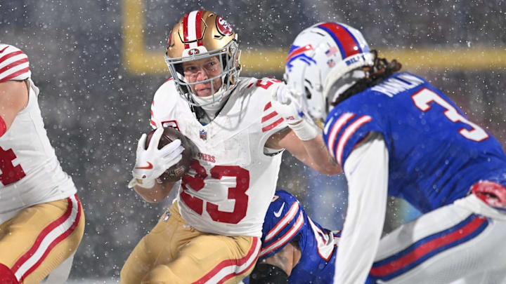 Dec 1, 2024; Orchard Park, New York, USA; San Francisco 49ers running back Christian McCaffrey (23) tries to avoid Buffalo Bills safety Damar Hamlin (3) on a run in the first quarter at Highmark Stadium. Mandatory Credit: Mark Konezny-Imagn Images Dec 1, 2024; Orchard Park, New York, USA; San Francisco 49ers running back Christian McCaffrey (23) tries to avoid Buffalo Bills safety Damar Hamlin (3) on a run in the first quarter at Highmark Stadium. Mandatory Credit: Mark Konezny-Imagn Images