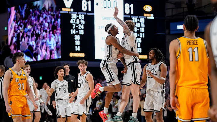 Vanderbilt guard Tyler Nickel (5) celebrates his three-point basket with guard MJ Collins Jr. (2) forcing the game against Missouri into overtime at Memorial Gym in Nashville, Tenn., Saturday, March 1, 2025.