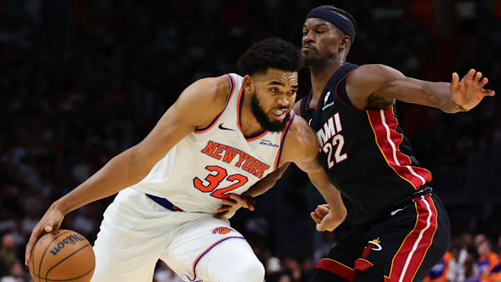Oct 30, 2024; Miami, Florida, USA; New York Knicks center Karl-Anthony Towns (32) drives to the basketball against Miami Heat forward Jimmy Butler (22) during the fourth quarter at Kaseya Center. Mandatory Credit: Sam Navarro-Imagn Images Oct 30, 2024; Miami, Florida, USA; New York Knicks center Karl-Anthony Towns (32) drives to the basketball against Miami Heat forward Jimmy Butler (22) during the fourth quarter at Kaseya Center. Mandatory Credit: Sam Navarro-Imagn Images