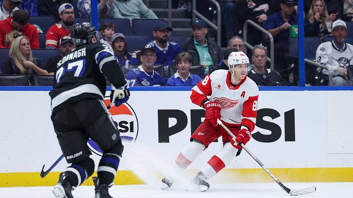 Jan 18, 2025; Tampa, Florida, USA; Detroit Red Wings right wing Patrick Kane (88) controls the puck against the Tampa Bay Lightning in the second period at Amalie Arena. Mandatory Credit: Nathan Ray Seebeck-Imagn Images
