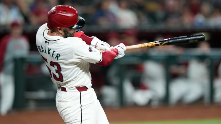Jun 13, 2024; Phoenix, Arizona, USA; Arizona Diamondbacks first base Christian Walker (53) hits a three run home run against the Los Angeles Angels during the first inning at Chase Field. Jun 13, 2024; Phoenix, Arizona, USA; Arizona Diamondbacks first base Christian Walker (53) hits a three run home run against the Los Angeles Angels during the first inning at Chase Field.