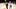 Dallas Wings forward Alanna Smith rises up to block Aces center A'ja Wilson, trailed by Paige Bueckers and Maddy Siegrist.