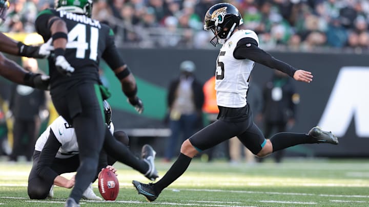 Dec 26, 2021; East Rutherford, New Jersey, USA; Jacksonville Jaguars kicker Matthew Wright (15) kicks a field goal during the first half against the New York Jets at MetLife Stadium. 