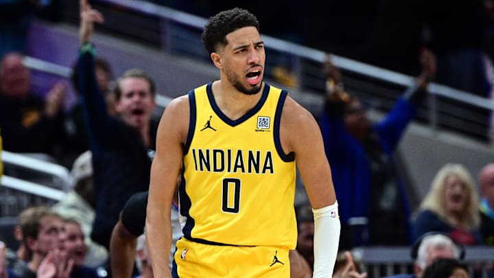 Oct 27, 2024; Indianapolis, Indiana, USA; Indiana Pacers guard Tyrese Haliburton (0) reacts to scoring points during overtime against the Philadelphia 76ers at Gainbridge Fieldhouse. Mandatory Credit: Marc Lebryk-Imagn Images