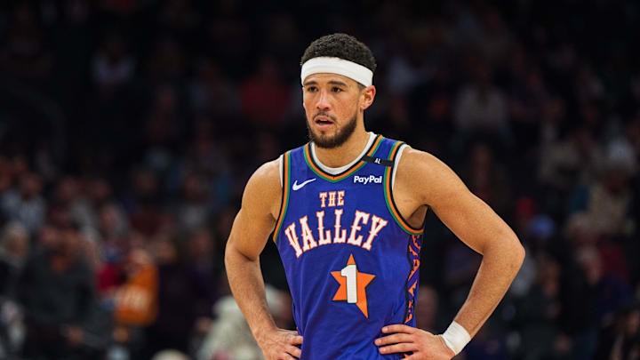 Dec 15, 2024; Phoenix, Arizona, USA; Phoenix Suns guard Devin Booker (1) reacts between plays in the second half during a game against the Portland Trail Blazers at Footprint Center. Mandatory Credit: Allan Henry-Imagn Images