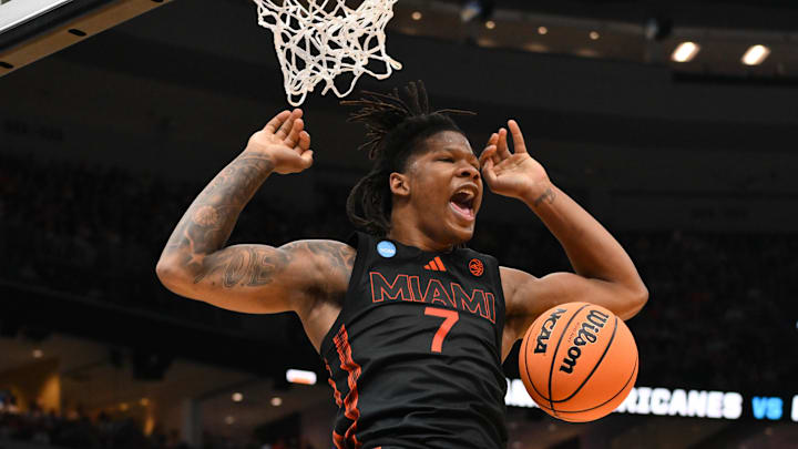 Mar 22, 2026; St. Louis, MO, USA; Miami Hurricanes forward Shelton Henderson (7) reacts after a dunk during the first half against the Purdue Boilermakers during a second round game of the men's 2026 NCAA Tournament at Enterprise Center. Mandatory Credit: Jeff Curry-Imagn Images