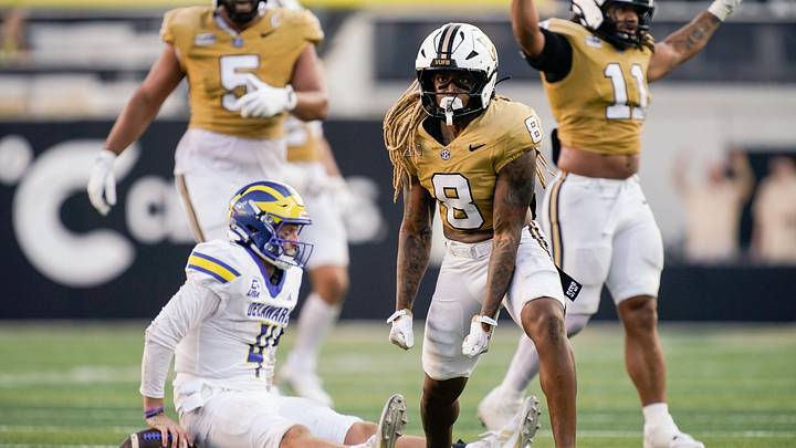 Vanderbilt safety CJ Heard (8) celebrates sacking Delaware quarterback Nick Minicucci (4) during the third quarter at FirstBank Stadium in Nashville, Tenn., Saturday, Sept. 12, 2026. Vanderbilt safety CJ Heard (8) celebrates sacking Delaware quarterback Nick Minicucci (4) during the third quarter at FirstBank Stadium in Nashville, Tenn., Saturday, Sept. 12, 2026.