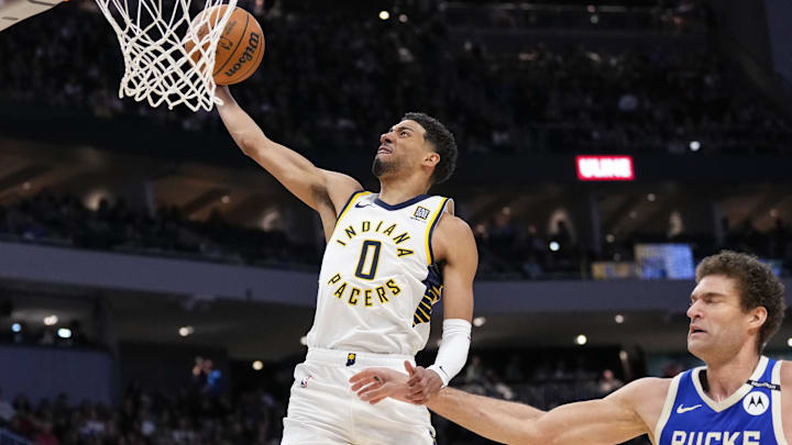 Mar 15, 2025; Milwaukee, Wisconsin, USA; Indiana Pacers guard Tyrese Haliburton (0) drives for a dunk during the second quarter against the Milwaukee Bucks at Fiserv Forum. Mandatory Credit: Jeff Hanisch-Imagn Images Mar 15, 2025; Milwaukee, Wisconsin, USA; Indiana Pacers guard Tyrese Haliburton (0) drives for a dunk during the second quarter against the Milwaukee Bucks at Fiserv Forum. Mandatory Credit: Jeff Hanisch-Imagn Images