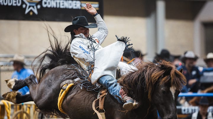 Clayton Biglow aboard Rafter H Rodeo Livestock's Cat Ballou in Tulsa, Okla. at the American Rodeo Contender Central Regionals Clayton Biglow aboard Rafter H Rodeo Livestock's Cat Ballou in Tulsa, Okla. at the American Rodeo Contender Central Regionals