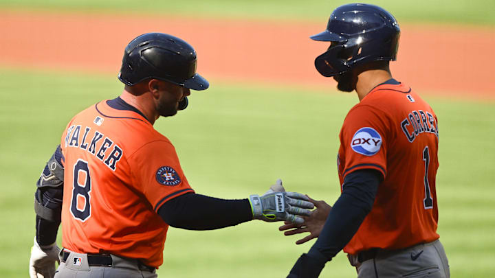 Aug 2, 2025; Boston, Massachusetts, USA; Houston Astros first baseman Christian Walker (8) celebrates with shortstop Carlos Correa (1) after hitting a two-run home run against the Boston Red Sox during the first inning at Fenway Park. 
