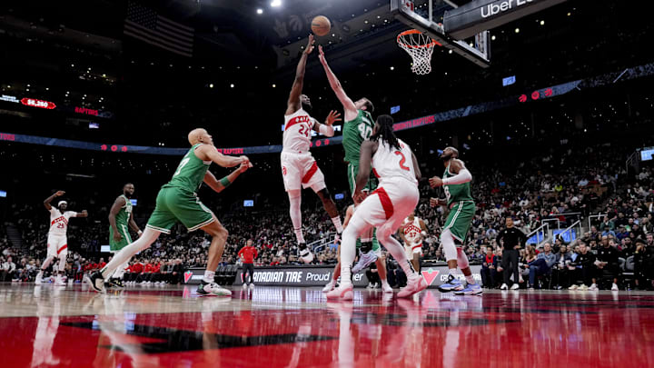Oct 15, 2024, Toronto, Ontario, CAN: Toronto Raptors forward Bruno Fernando (24) drives to the net against the Boston Celtics during the second half at Scotiabank Arena. Mandatory Credit: Kevin Sousa-Imagn Images