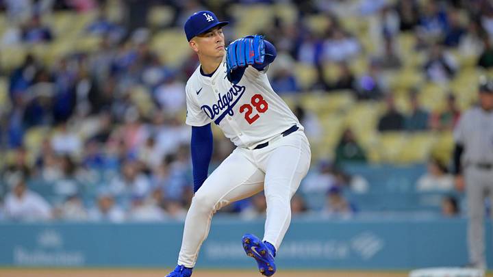 Apr 16, 2025; Los Angeles, California, USA;  Los Angeles Dodgers pitcher Bobby Miller (28) pitches in the first inning against the Colorado Rockies at Dodger Stadium. Mandatory Credit: Jayne Kamin-Oncea-Imagn Images