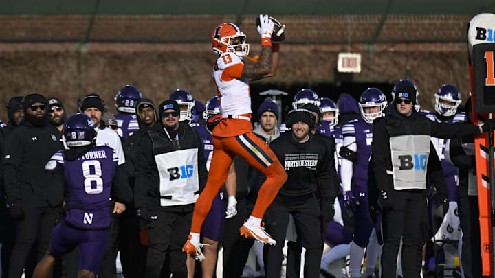 Nov 30, 2024; Chicago, Illinois, USA; Illinois Fighting Illini wide receiver Pat Bryant (13) catches a pass against Northwestern Wildcats during the second half at Wrigley Field. Mandatory Credit: Matt Marton-Imagn Images Nov 30, 2024; Chicago, Illinois, USA; Illinois Fighting Illini wide receiver Pat Bryant (13) catches a pass against Northwestern Wildcats during the second half at Wrigley Field. Mandatory Credit: Matt Marton-Imagn Images