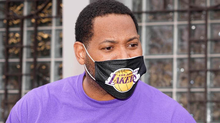 Nov 18, 2021; Los Angeles, CA, USA; Robert Horry wears a face mask during the Los Angeles Lakers Season of Giving Turkey Giveaway at The Salvation Army   Red Shield Youth & Community Center. Mandatory Credit: Kirby Lee-Imagn Images