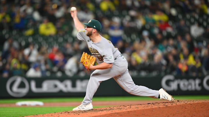 Mar 28, 2025; Seattle, Washington, USA; Athletics relief pitcher Justin Sterner (60) pitches to the Seattle Mariners during the seventh inning at T-Mobile Park. Mandatory Credit: Steven Bisig-Imagn Images Mar 28, 2025; Seattle, Washington, USA; Athletics relief pitcher Justin Sterner (60) pitches to the Seattle Mariners during the seventh inning at T-Mobile Park. Mandatory Credit: Steven Bisig-Imagn Images