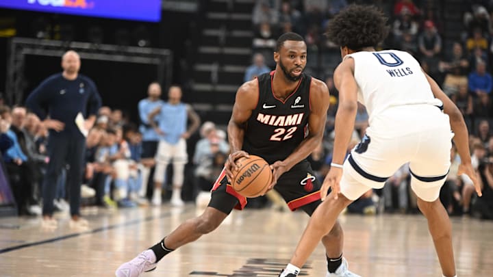 Mar 15, 2025; Memphis, Tennessee, USA; Miami Heat small forward Andrew Wiggins (22) faces off with defender Memphis Grizzlies forward Jalen Wells (0) in the first quarter of the game against the Memphis Grizzlies at FedExForum. Mandatory Credit: Matthew Smith-Imagn Images