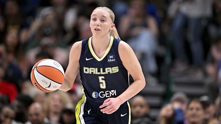 Jun 27, 2025; Dallas, Texas, USA; Dallas Wings guard Paige Bueckers (5) brings the ball up court against the Indiana Fever during the second quarter at the American Airlines Center. Mandatory Credit: Jerome Miron-Imagn Images
