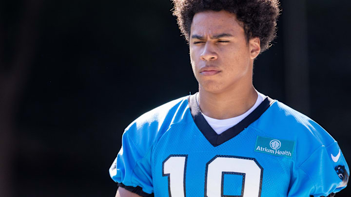 Jul 24, 2025; Charlotte, NC, USA; Carolina Panthers wide receiver Jalen Coker (18) walks out for training camp.