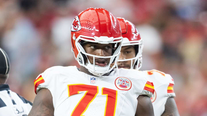 Aug 9, 2025; Glendale, Arizona, USA; Kansas City Chiefs offensive tackle Josh Simmons (71) against the Arizona Cardinals during a preseason NFL game at State Farm Stadium. Mandatory Credit: Mark J. Rebilas-Imagn Images