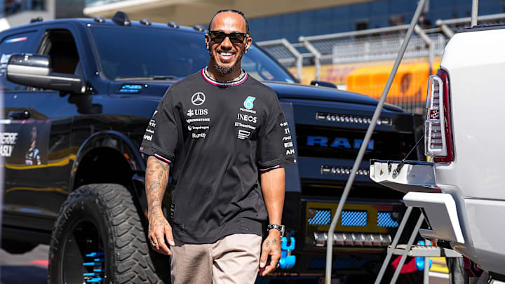 Oct 20, 2024; Austin, Texas, USA; Mercedes-AMG Petronas driver Lewis Hamilton walks the track ahead of the drivers' parade at the Formula 1 Pirelli United States Grand Prix at Circuit of the Americas. Mandatory Credit: Aaron E. Martinez-Imagn Images