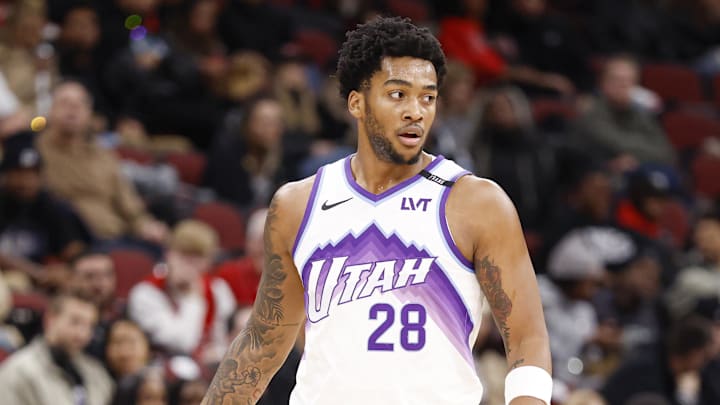 Jan 14, 2026; Chicago, Illinois, USA; Utah Jazz forward Brice Sensabaugh (28) brings the ball up court against the Chicago Bulls during the first half at United Center. 