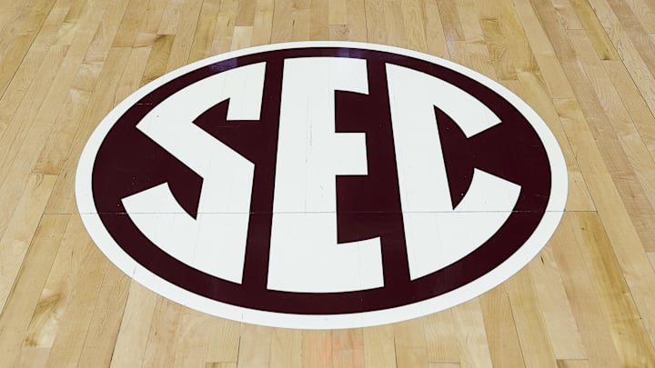 SEC logo on the court at Reed Arena prior to the game between the Texas A&M Aggies and the Montana Grizzlies SEC logo on the court at Reed Arena prior to the game between the Texas A&M Aggies and the Montana Grizzlies